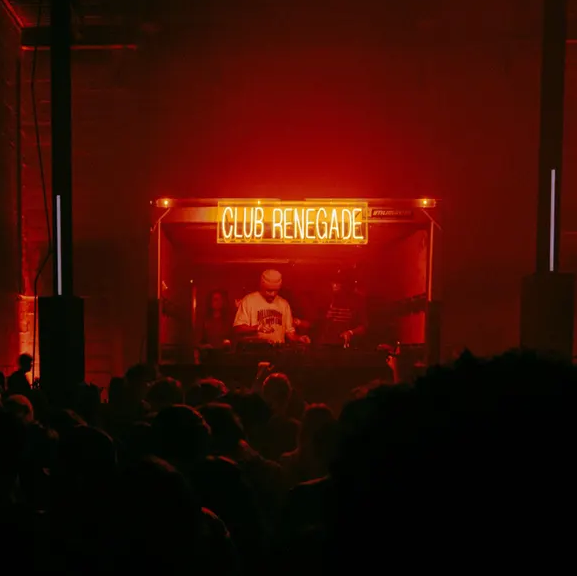 Club Renegade, red-lit warehouse DJ set